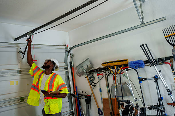 Professional Garage Door Panel Replacement technician working in West Portsmouth, OH